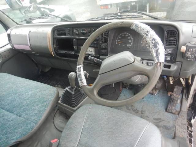 1999 Mitsubishi Fuso Canter 塵芥車 auction photo 2