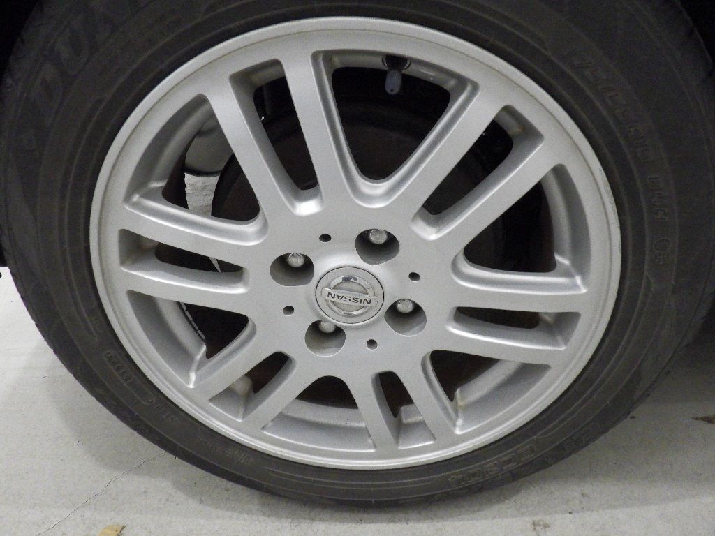 2011 Nissan Cube 15X FOUR Mセレクション auction photo 9