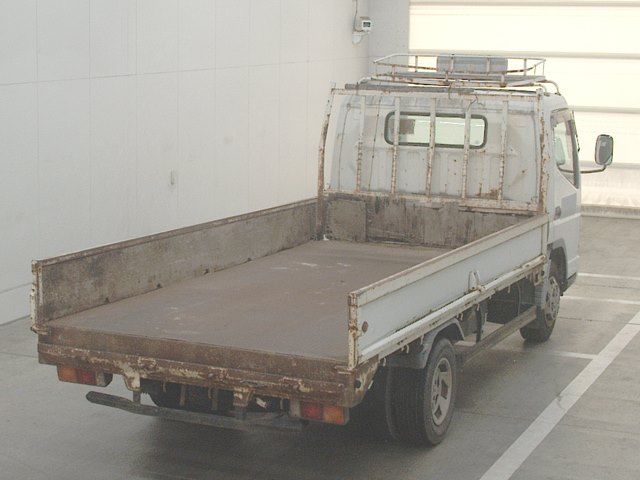 2002 Mitsubishi Fuso Canter Flatbed auction photo 2