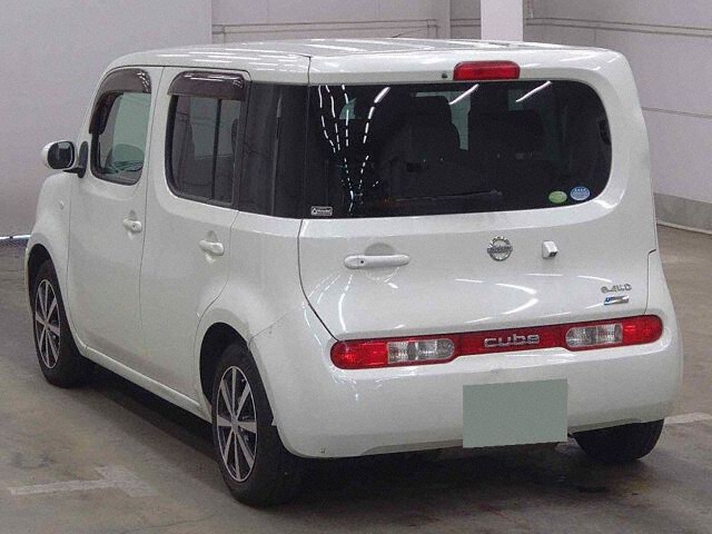 2010 Nissan Cube 15X FOUR Vセレク 4WD auction photo 2