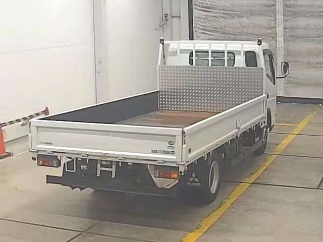 2016 Mitsubishi Fuso Canter Flatbed auction photo 2