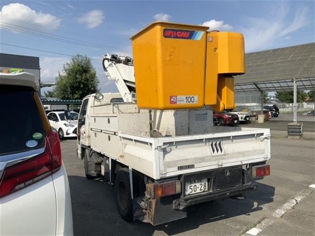 1991 Isuzu Elf コウショサギョウシャ auction photo 2