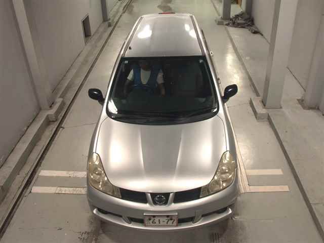 2010 Nissan ウイングロード 15B FOUR auction photo 6