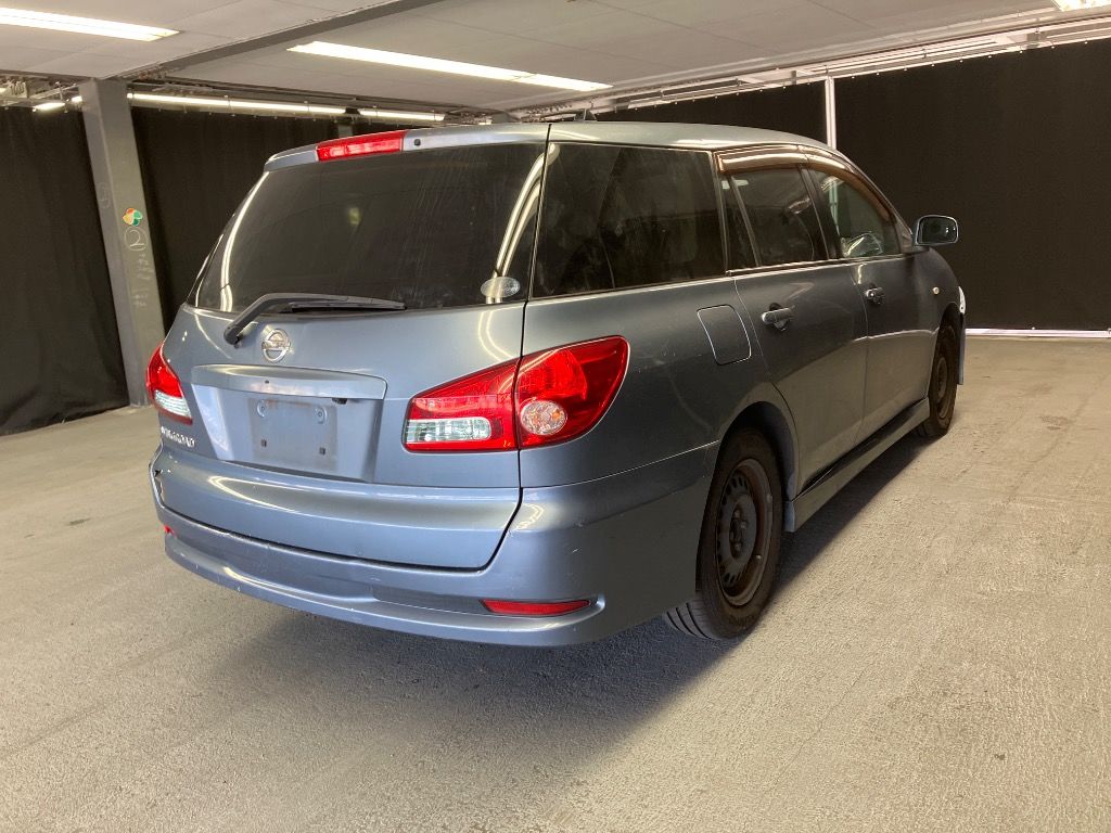 2011 Nissan ウイングロード 15RXエアロ auction photo 4