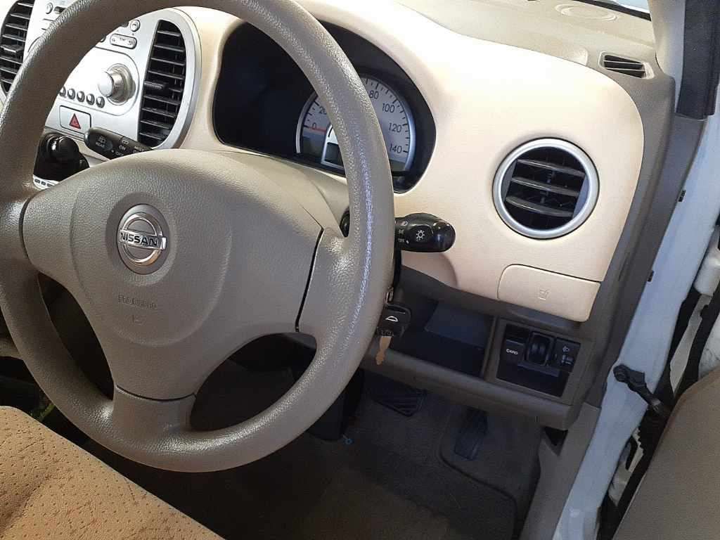2010 Nissan モコ S auction photo 9