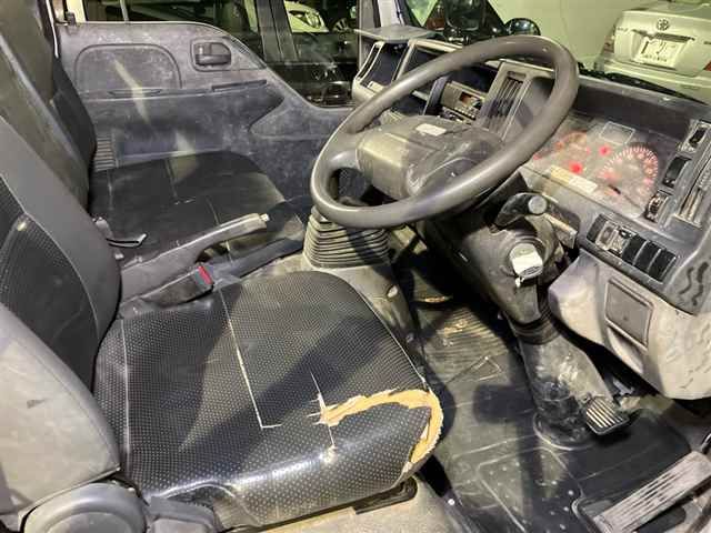 2014 Isuzu Elf ヒラボディ 2t ゼンテイショウ auction photo 7