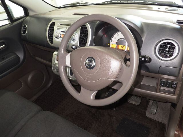 2008 Nissan モコ E FOURショコラティエ 4WD auction photo 3
