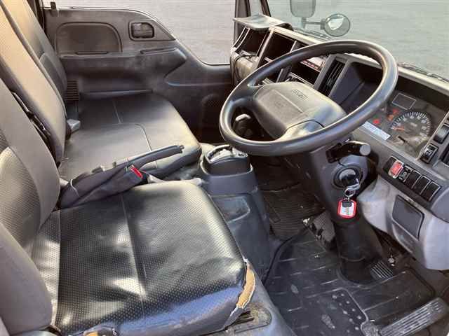 2014 Isuzu Elf ヒラボディ 2t ゼンテイショウ auction photo 7