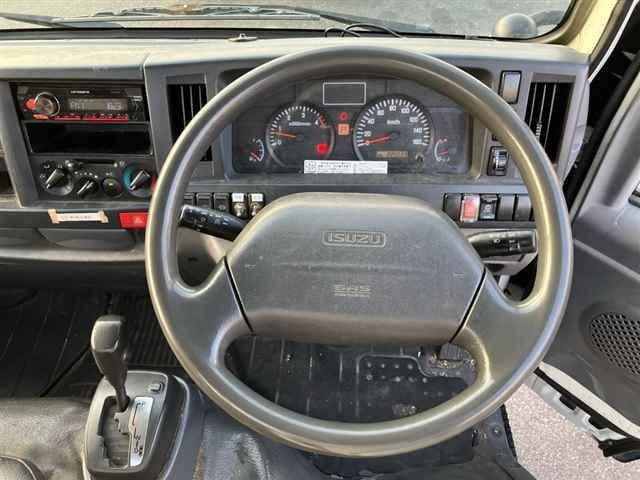 2014 Isuzu Elf ヒラボディ 2t ゼンテイショウ auction photo 3