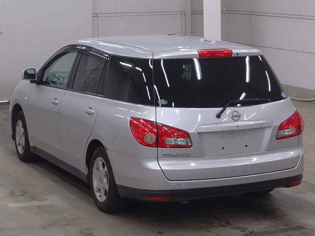 2011 Nissan ウイングロード 4WD auction photo 2