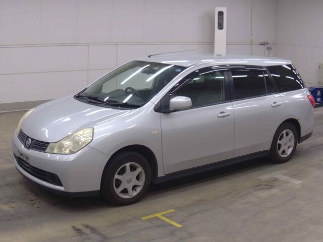 2011 Nissan ウイングロード 4WD auction photo 3