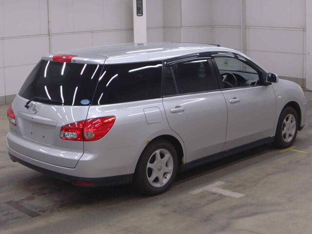2011 Nissan ウイングロード 4WD auction photo 4