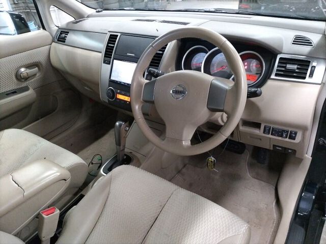 2009 Nissan ティーダ 15M FOUR 4WD auction photo 3