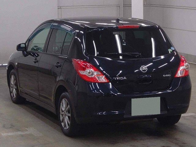 2009 Nissan ティーダ 15M FOUR 4WD auction photo 2
