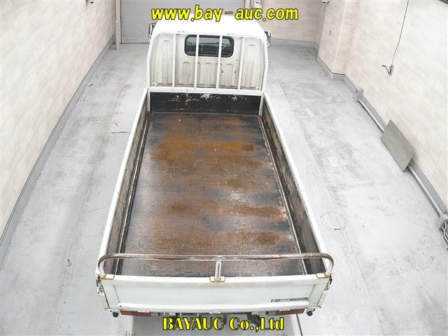 2005 Mitsubishi Fuso Canter ヒラボディ 2.0tツミ auction photo 5