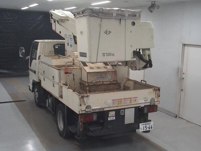 2005 Isuzu Elf コウショサギョウシャ auction photo 2