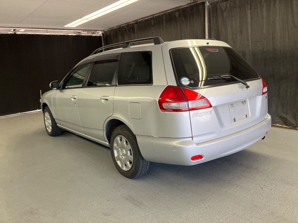 1999 Nissan ウイングロード X auction photo 2