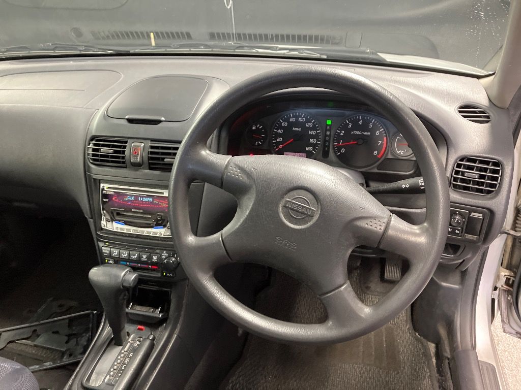 1999 Nissan ウイングロード X auction photo 3