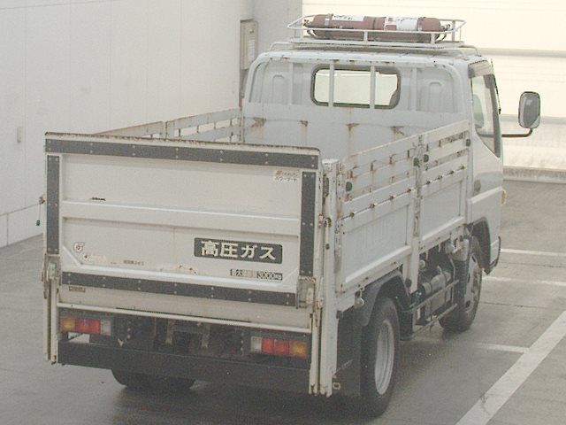 2019 Mitsubishi Fuso Canter Flatbed auction photo 2