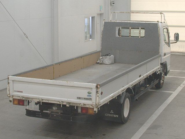 2003 Mitsubishi Fuso Canter 平ボディ auction photo 2