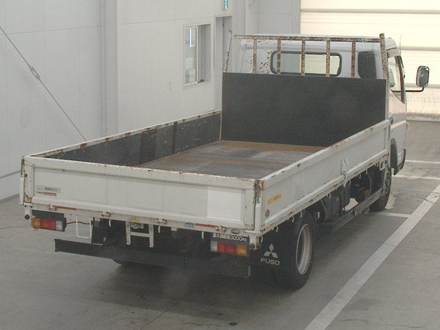 2019 Mitsubishi Fuso Canter Flatbed auction photo 2