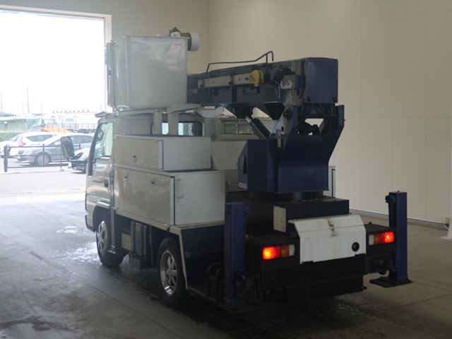 2005 Isuzu Elf コウショサギョウ auction photo 2