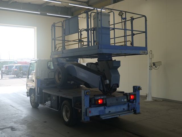 2012 Isuzu Elf コウショサギョウ auction photo 2