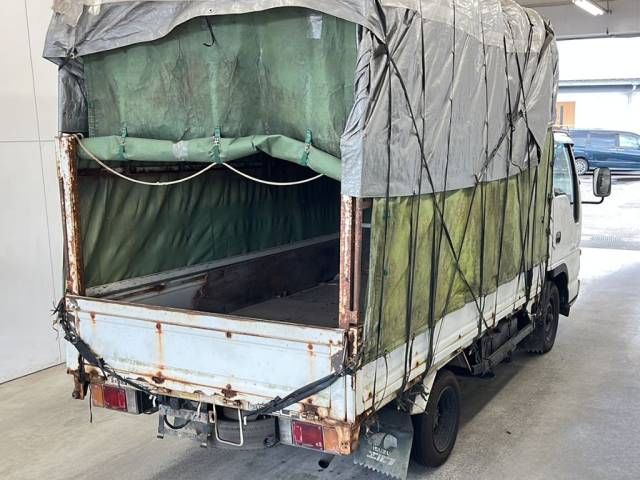 1995 Isuzu Elf 平ボディ 幌車 1.5t auction photo 3
