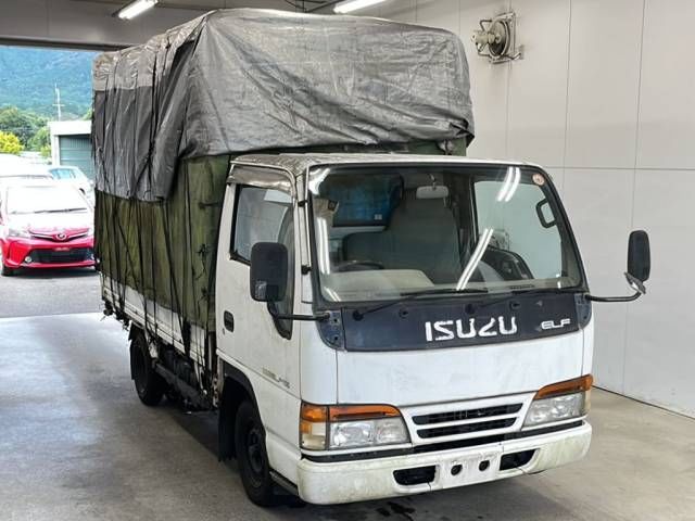 1995 Isuzu Elf 平ボディ 幌車 1.5t auction photo 4