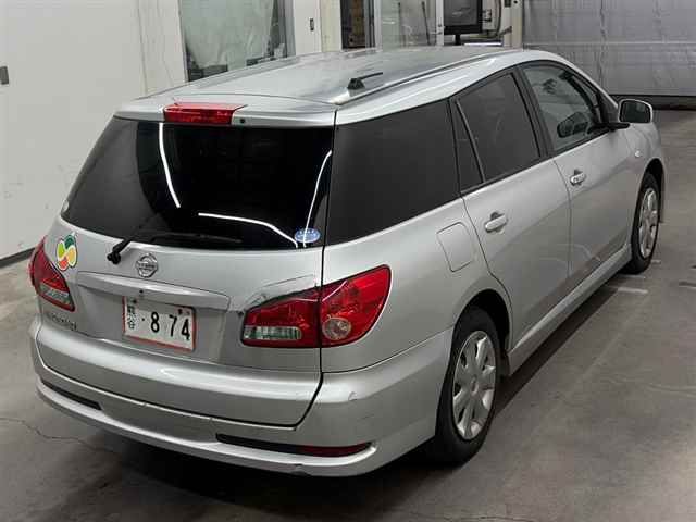 2010 Nissan ウイングロード 15M auction photo 5