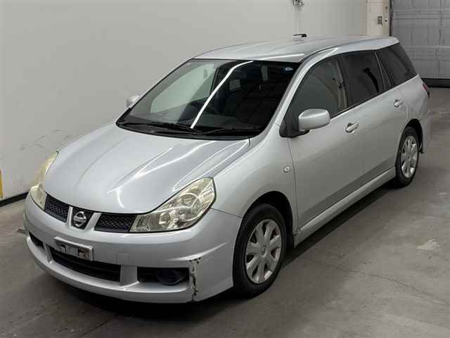 2010 Nissan ウイングロード 15M auction photo 4