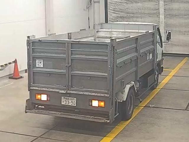 1999 Mitsubishi Fuso Canter ダンプ auction photo 2